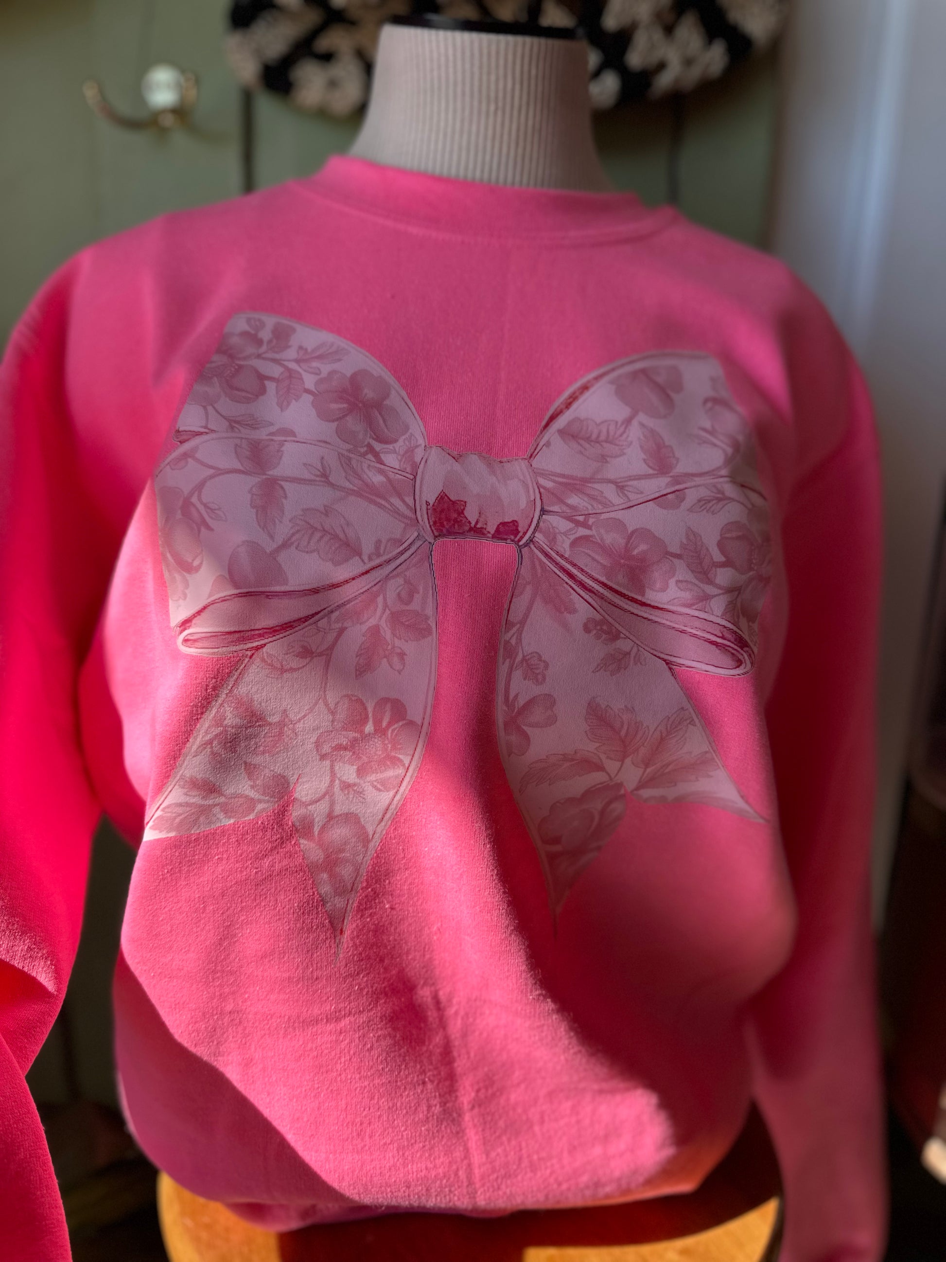 Pink floral bow crewneck